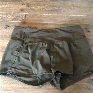 Lululemon dark green speed up shorts. Size 4.